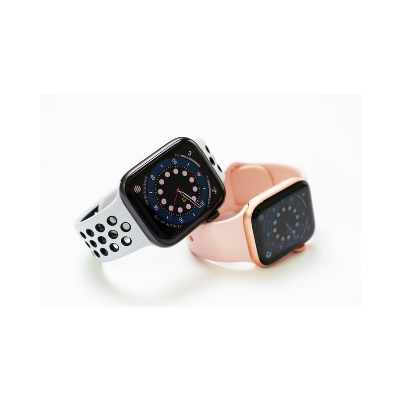 Two smartwatches, one silver and one rose gold, on a white background